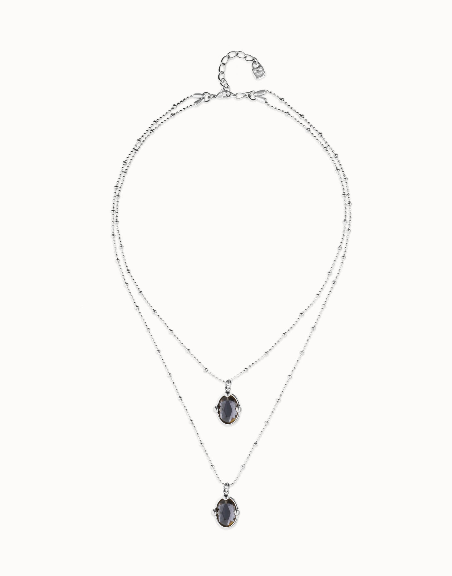 Multi strand necklace with two black oval faceted crystals null