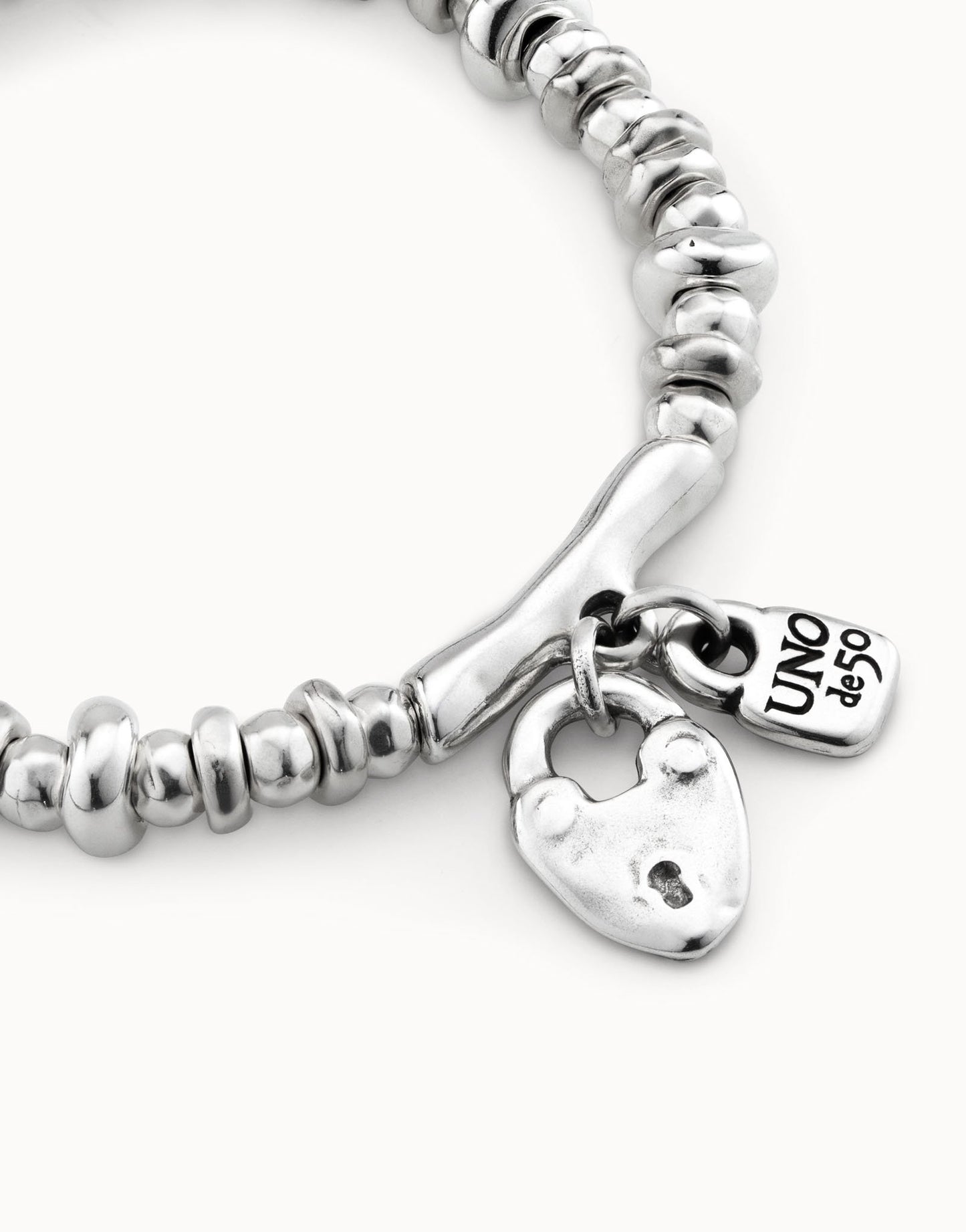 Silver Beaded stretch bracelet with charms