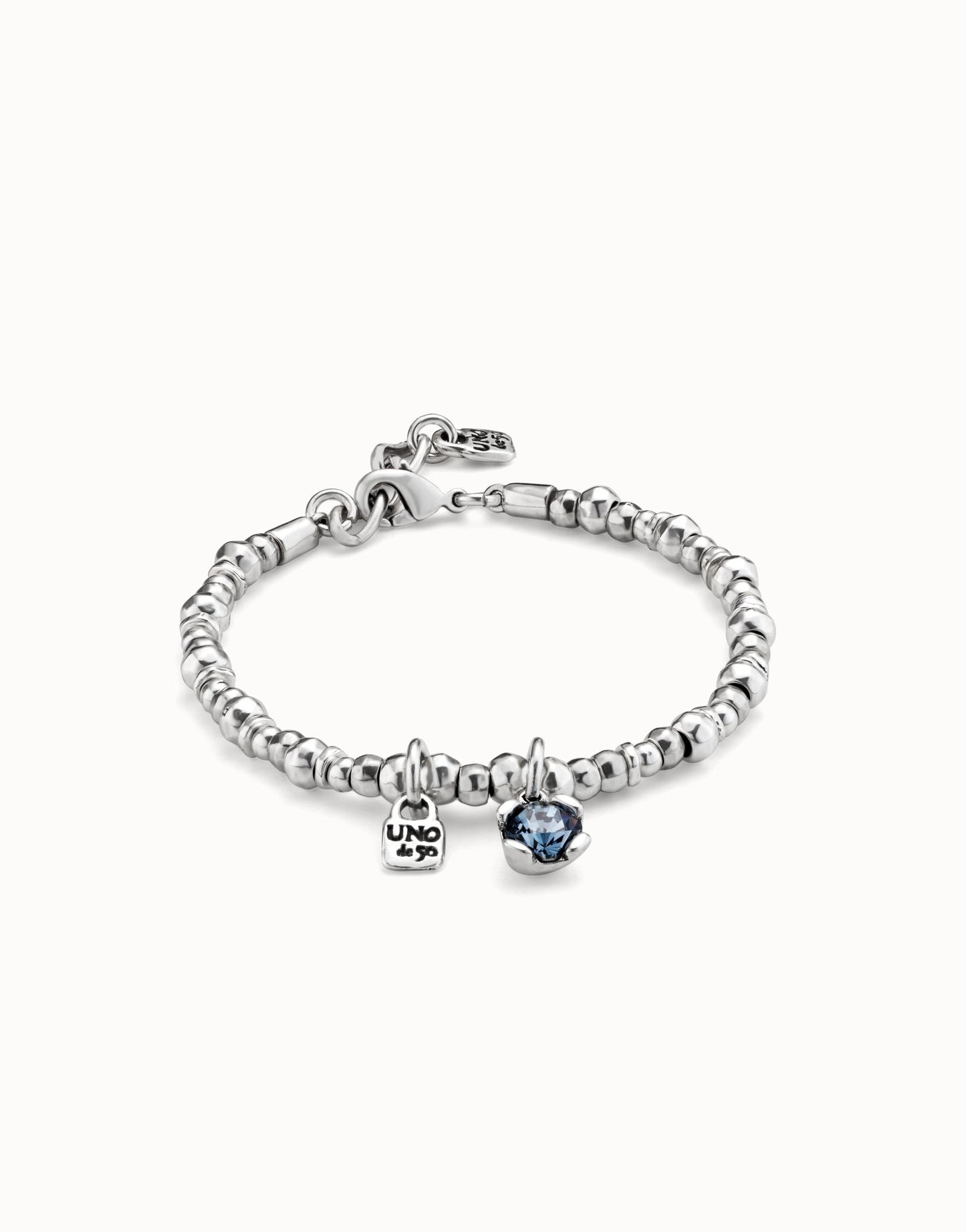 Silver Beaded stretch bracelet with blue crystal