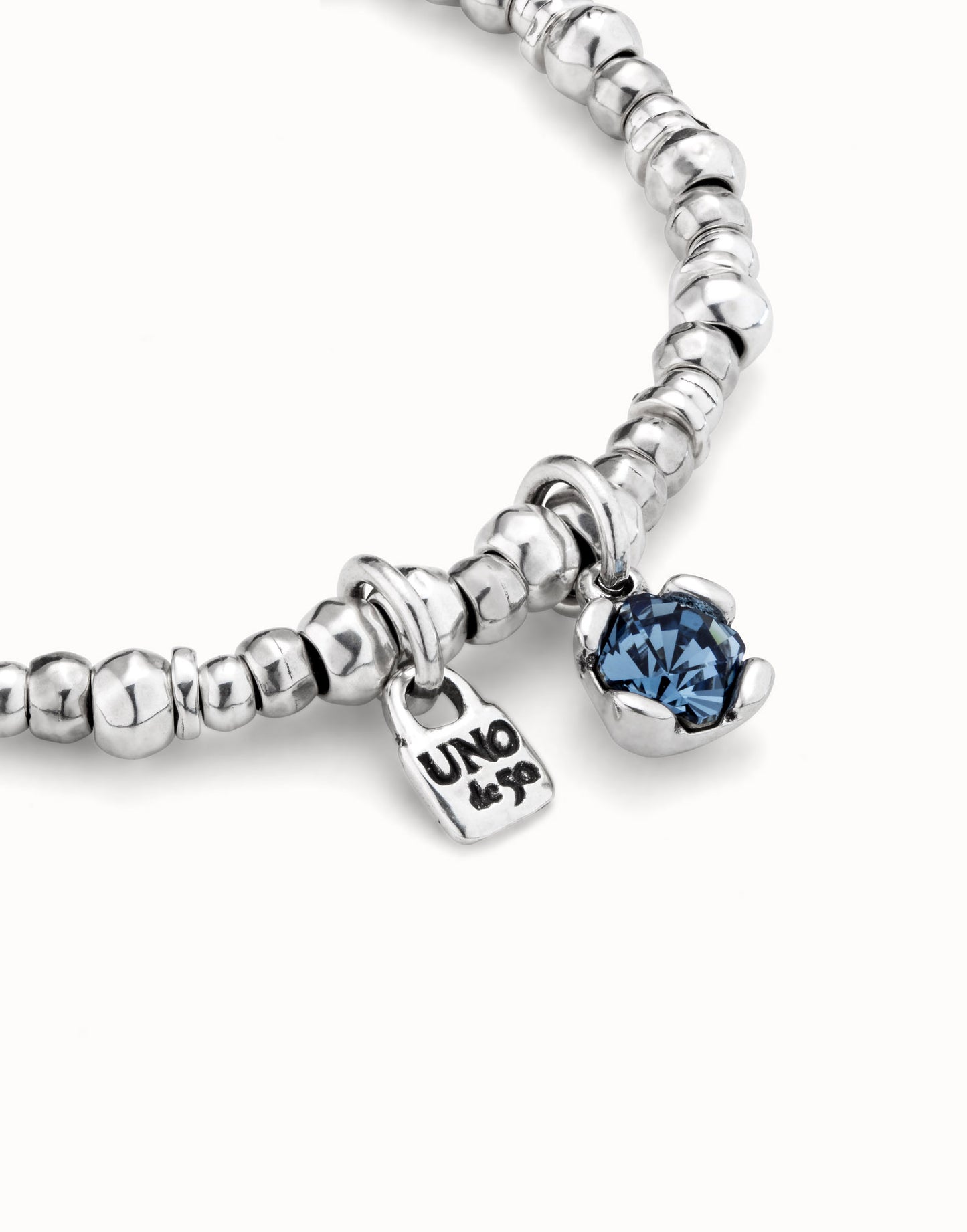 Silver Beaded stretch bracelet with blue crystal