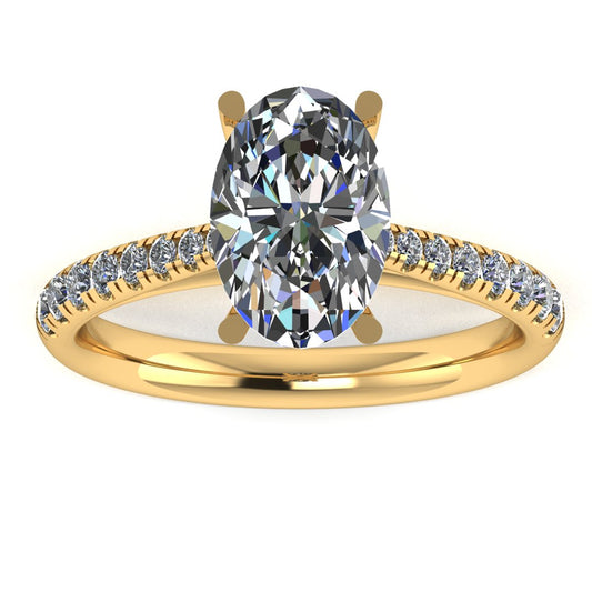 Oval Diamond ring with Diamond set Shoulders and Secret Diamond Setting