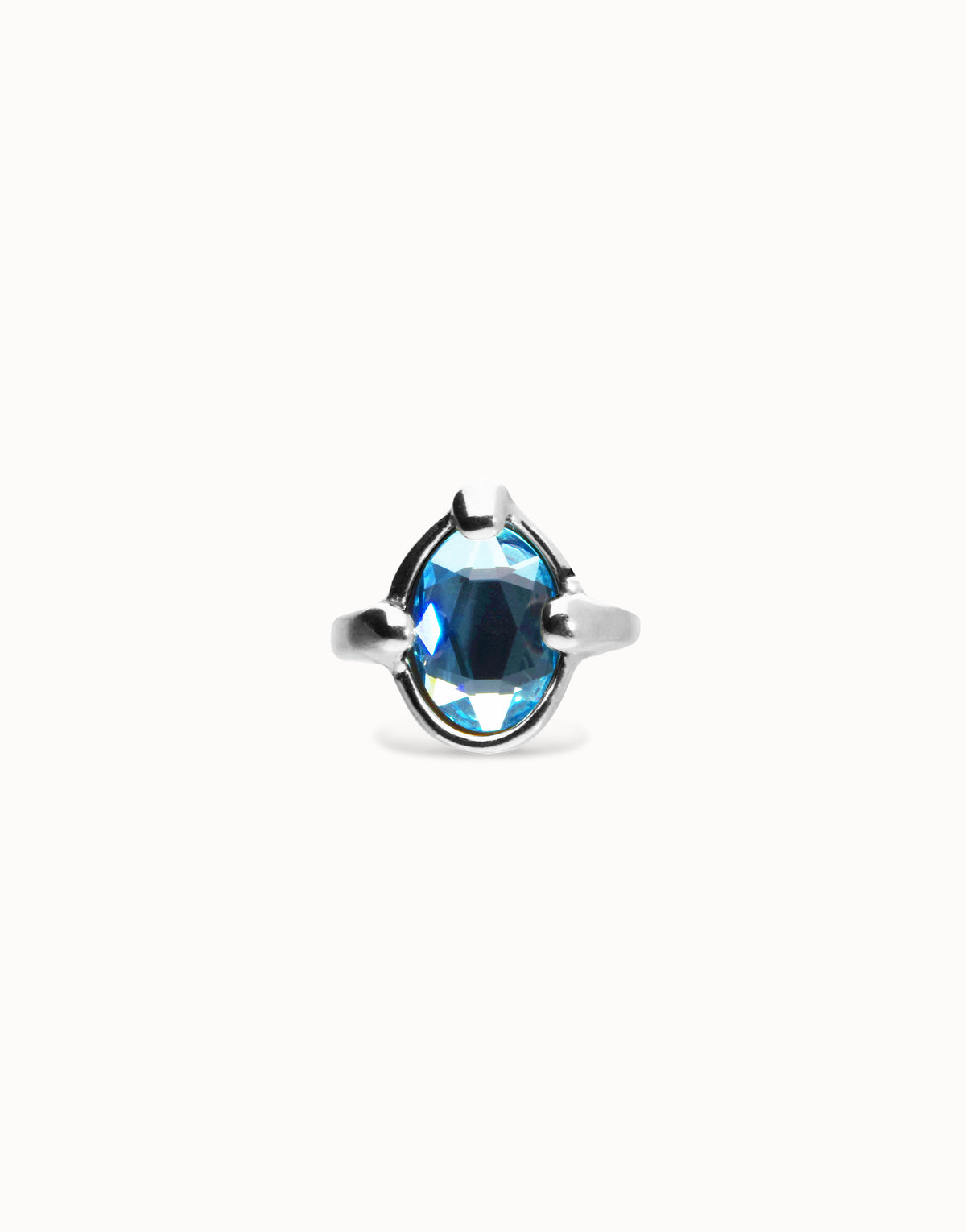 Ring with blue oval faceted crystal