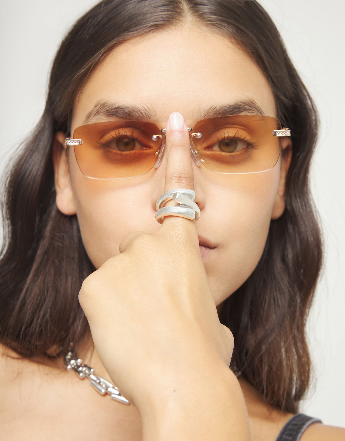 Ring with three intertwined organic shapes