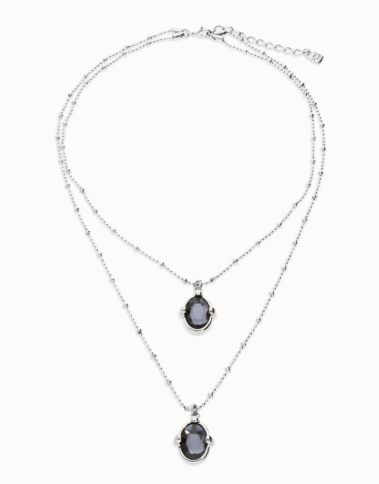 Multi strand necklace with two black oval faceted crystals null