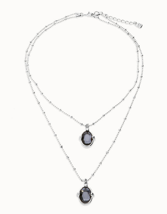 Multi strand necklace with two black oval faceted crystals null