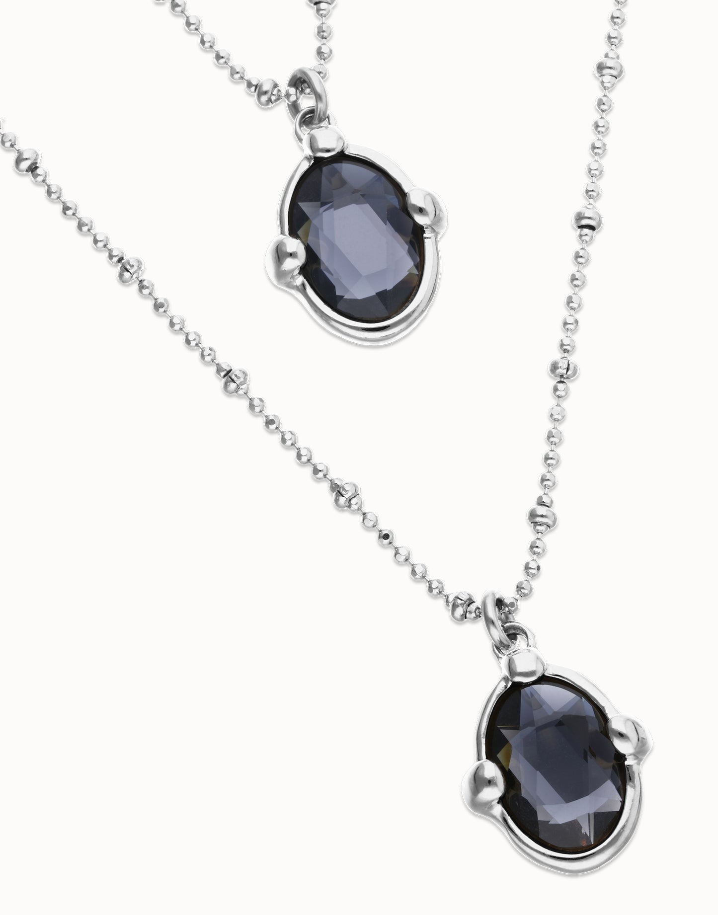 Multi strand necklace with two black oval faceted crystals null