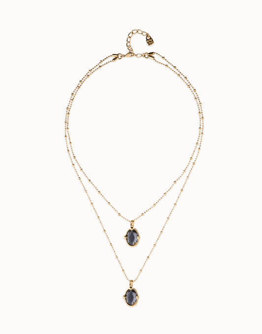 Multi strand necklace with two black oval faceted crystals
