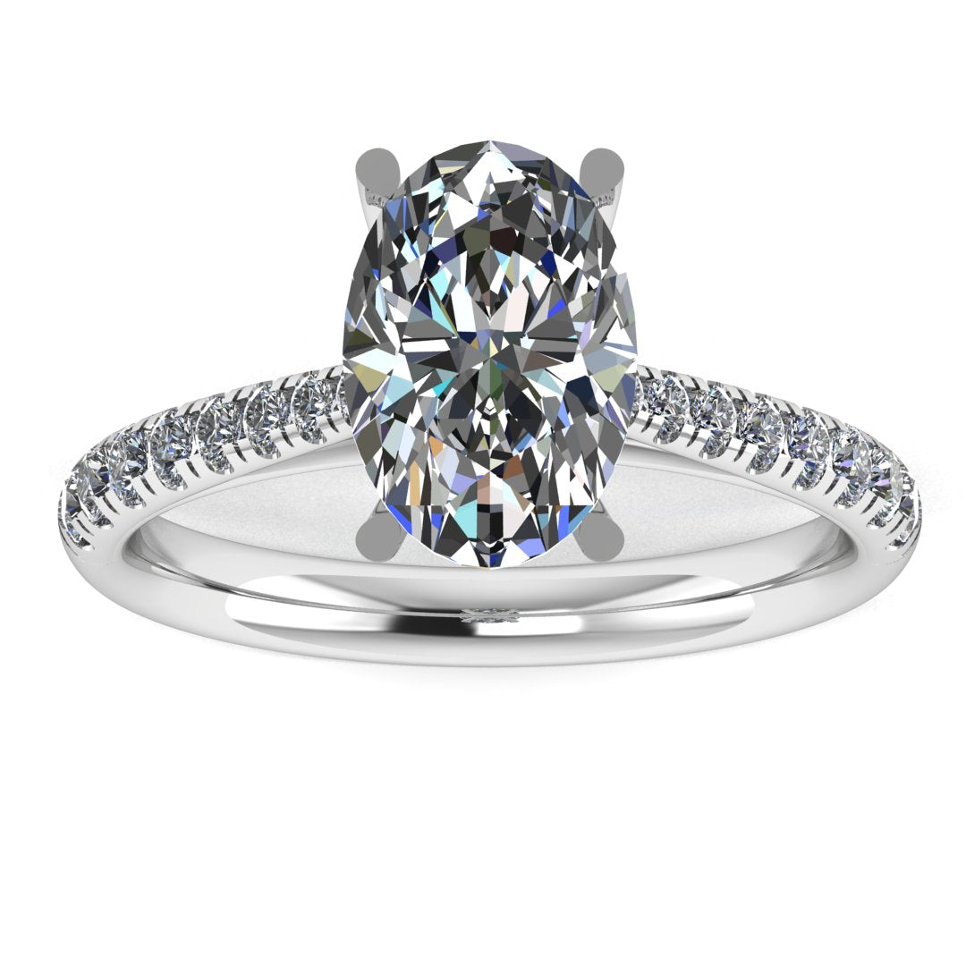 Oval Diamond ring with Diamond set Shoulders and Secret Diamond Setting