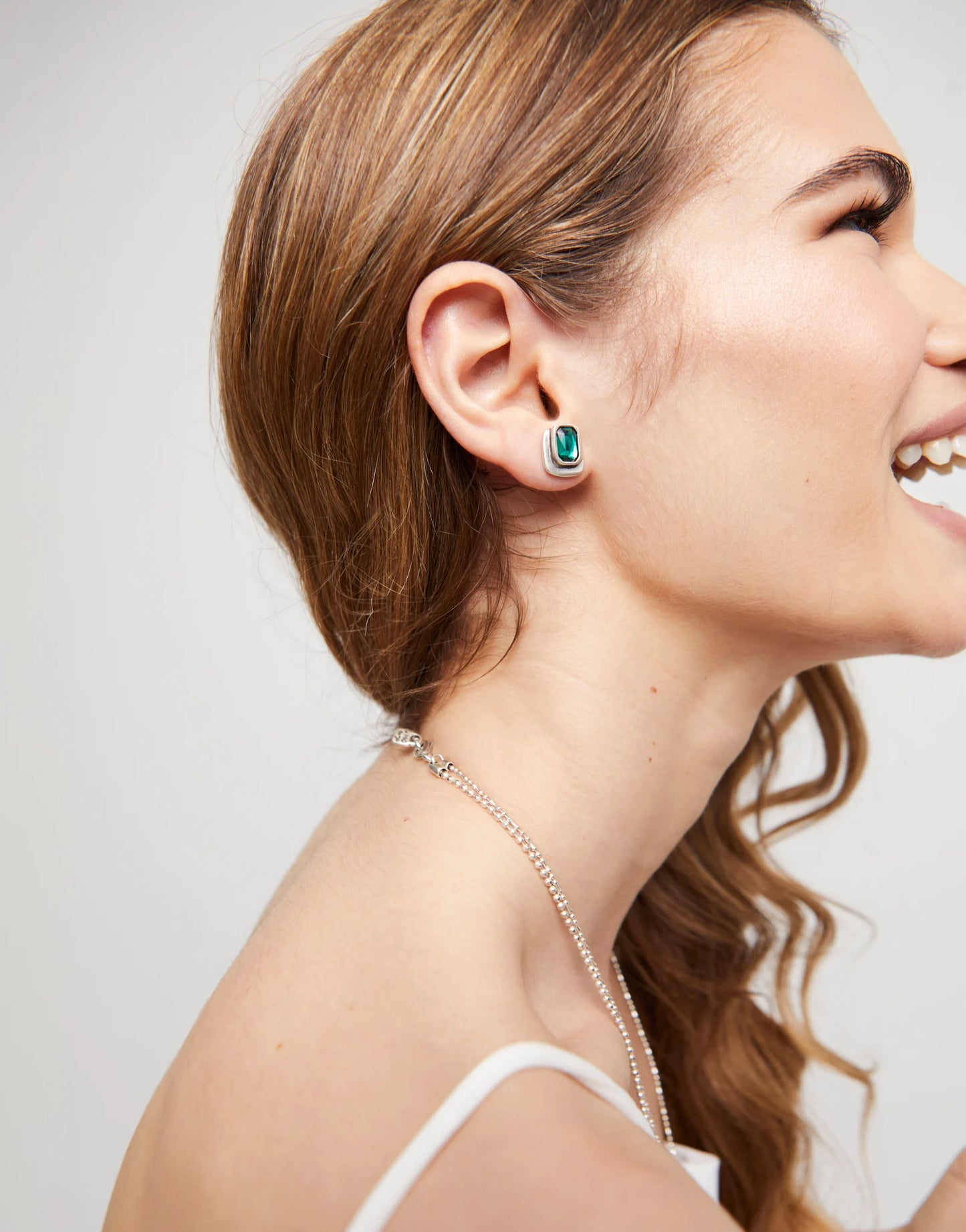 Stud earrings with green crystal