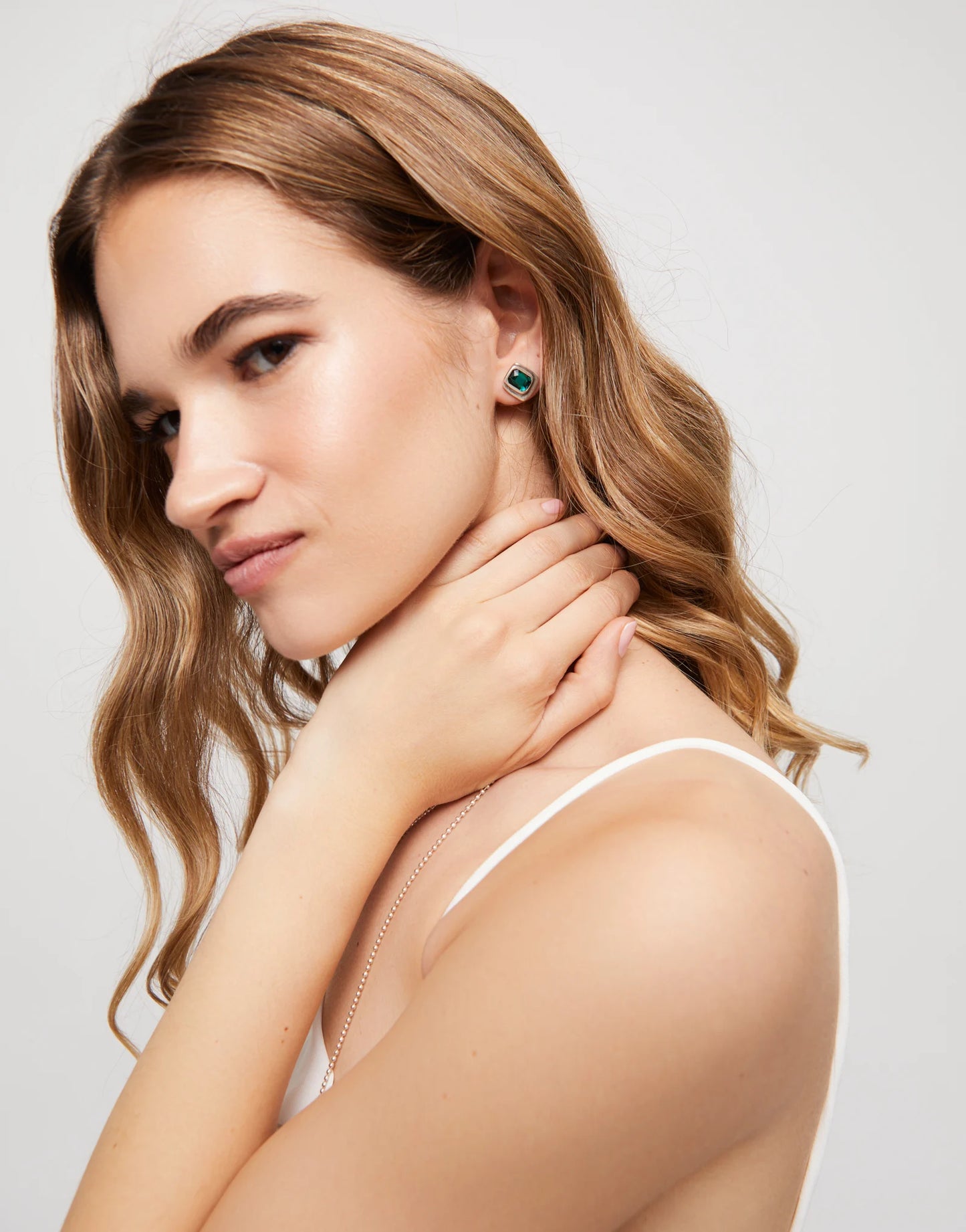 Stud earrings with green crystal