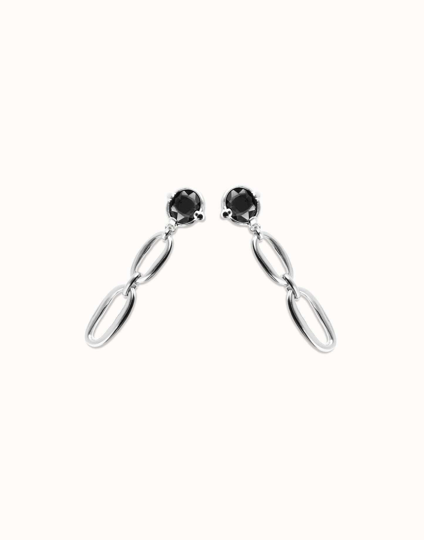 Drop earrings with faceted black crystal and links