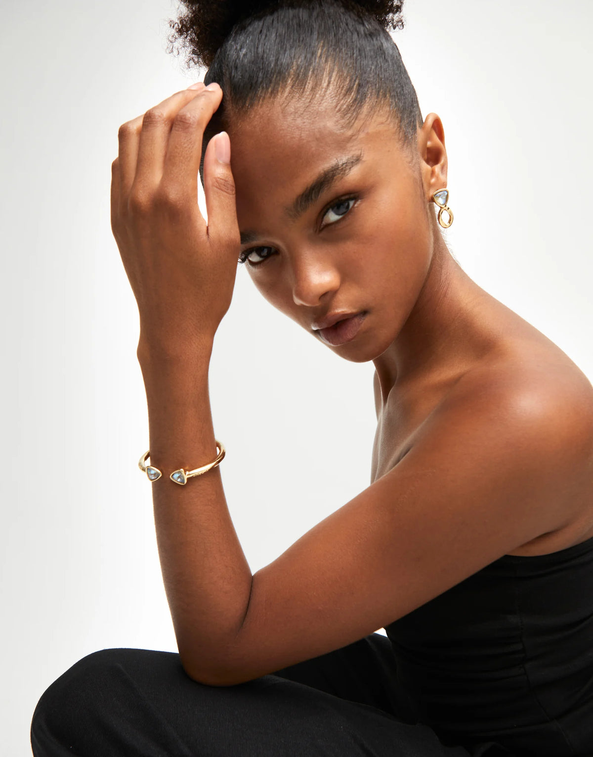Cuff bracelet with two multicolored crystals