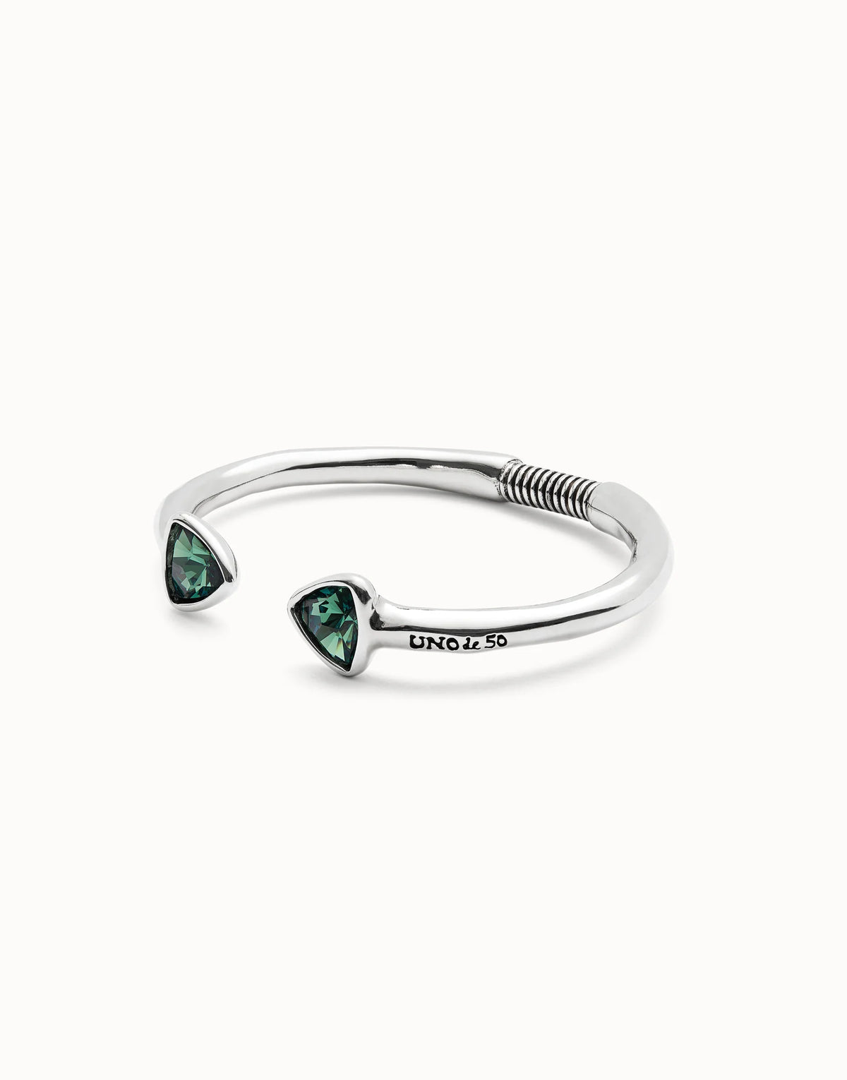 Cuff bracelet with two green crystals