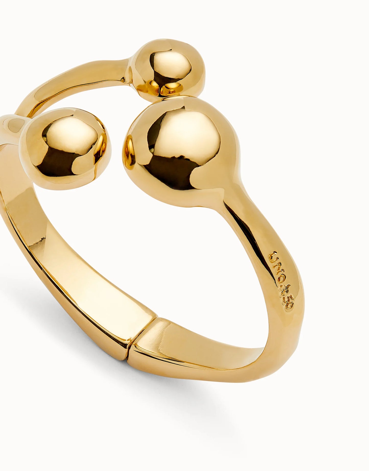 Golden Cuff bracelet with three beads