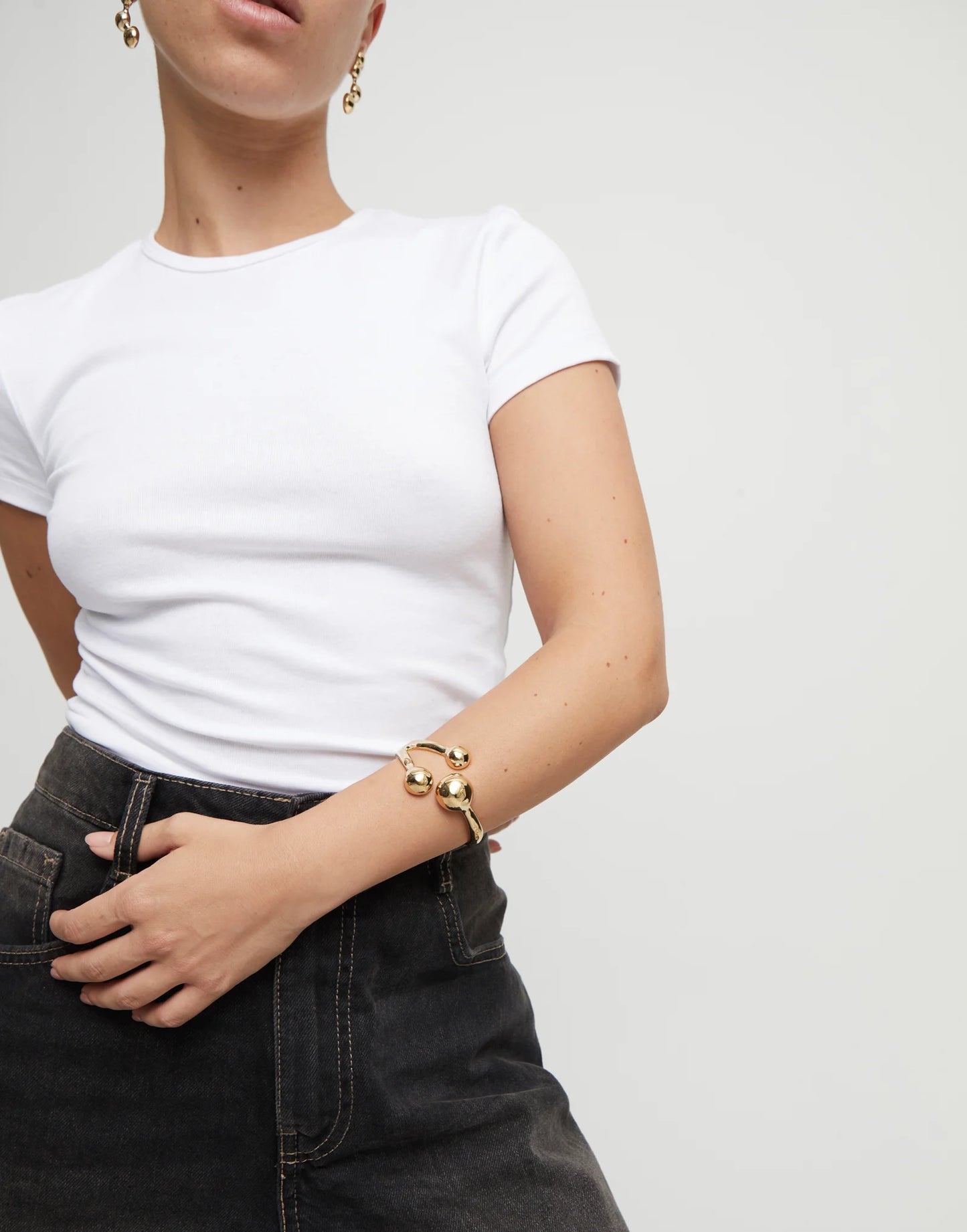 Golden Cuff bracelet with three beads