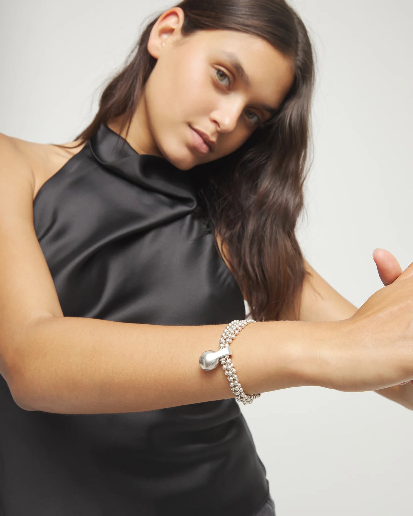 Bracelet with silver threads and large sphere